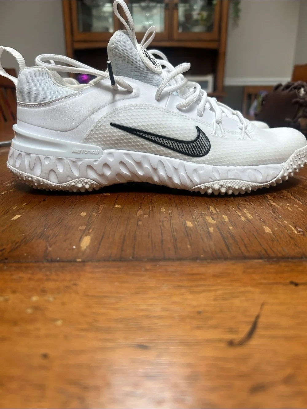 Nike Kids White Athletic Sneakers with Black Swoosh